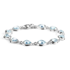 Henryka Classic Teardrop Link Bracelet In Silver And Blue Topaz