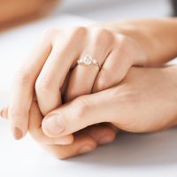 picture of man and woman with wedding ring